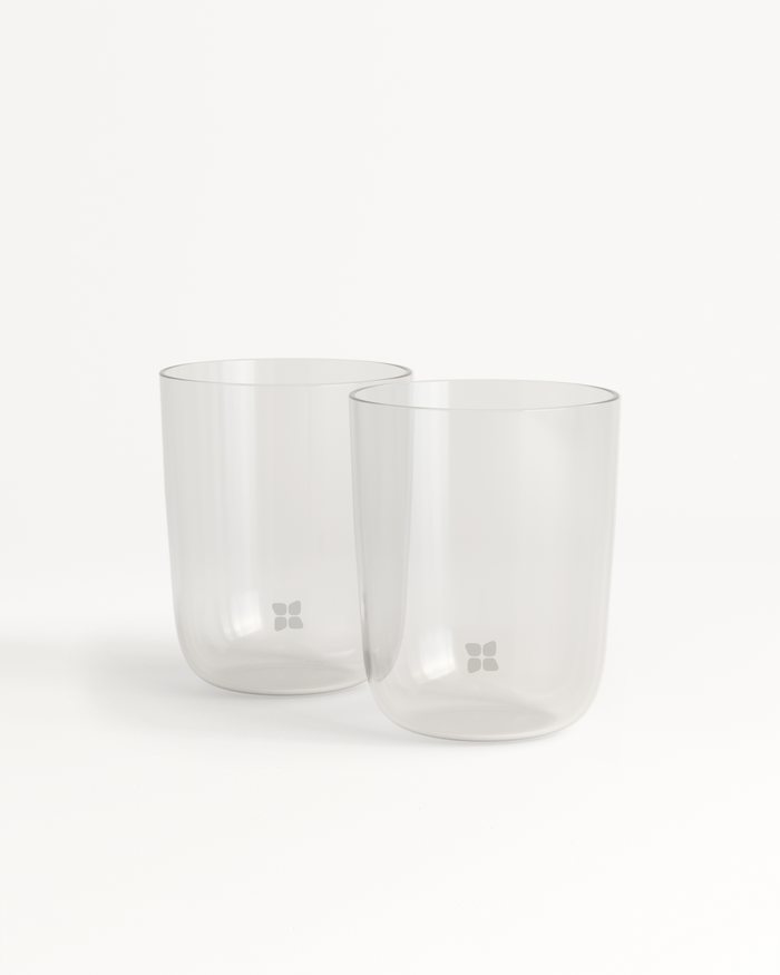 Clear Glasses: two 500ml borosilicate glass containers showcasing distinct, functional design; ideal for enhancing waterdrop® flavors.