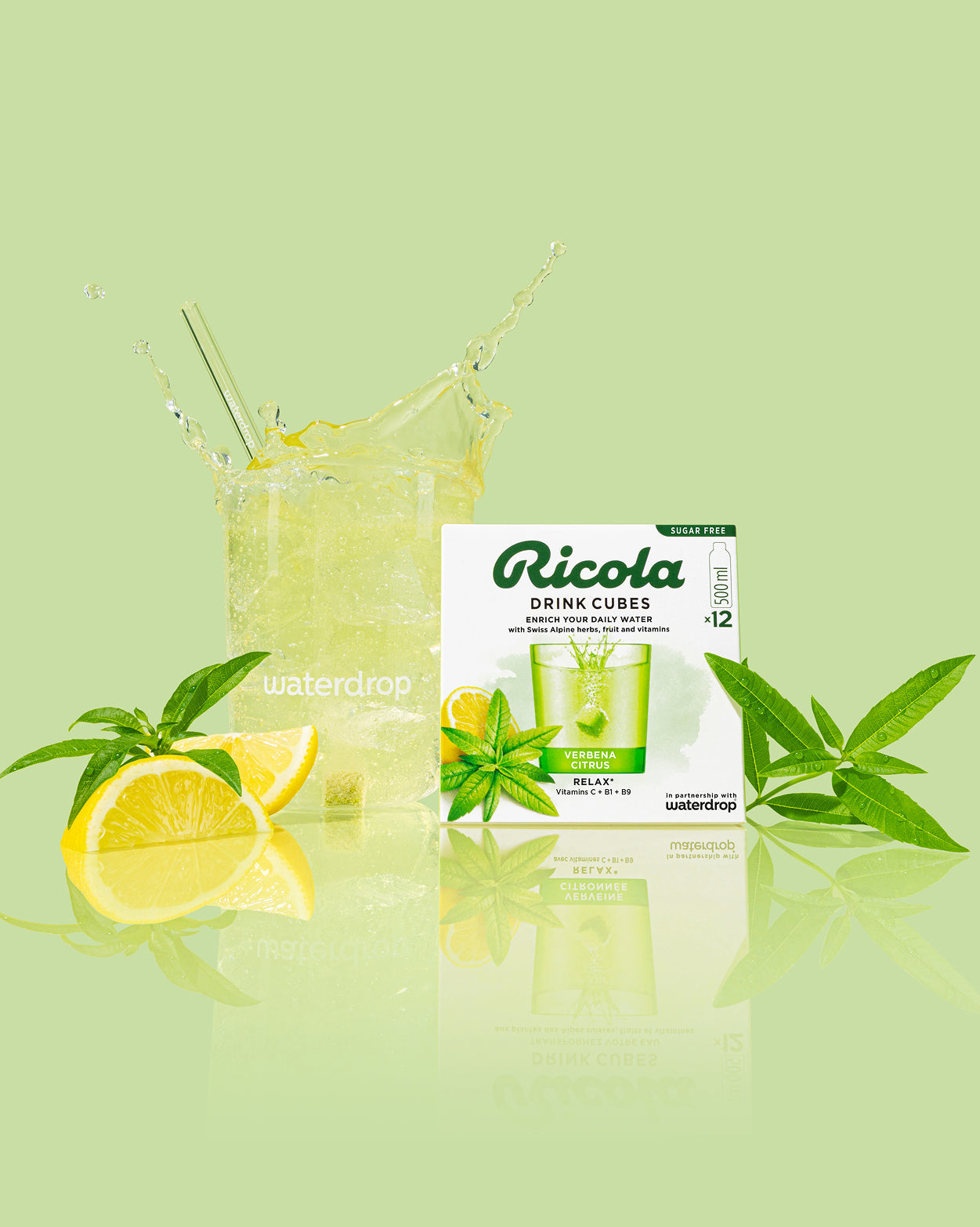 Verbena Citrus drink with Ricola cubes, lemon, and verbena leaves.