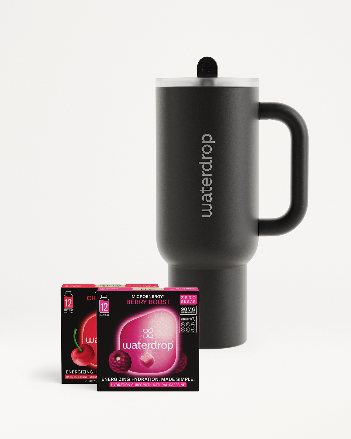Active Mode Set featuring a matte-black Waterdrop travel mug with lid and handle, alongside Berry Boost and cherry-flavored Microenergy hydration cubes for enhanced energy.