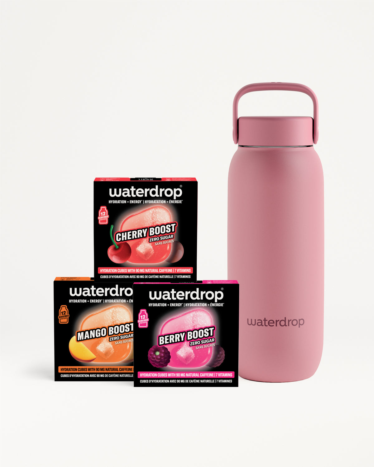 Pink insulated water bottle with handle beside three small black flavor boxes.