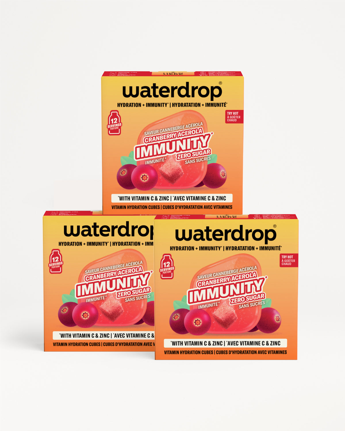 Three orange-yellow Waterdrop immunity supplement boxes stacked together with berry graphics.