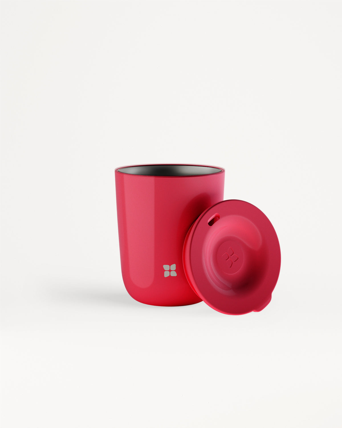Red mug with a matching red lid on a white background.