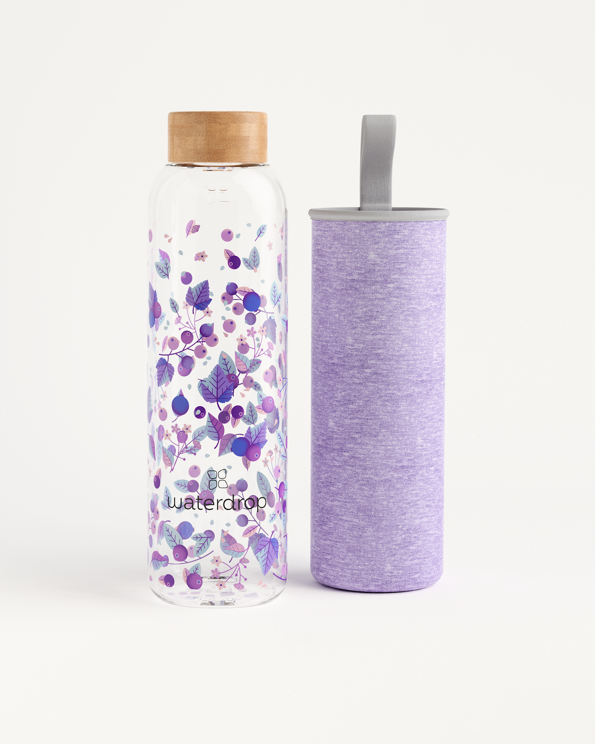 Close-up of Edition Glass bottle made from durable borosilicate glass designed for eco-friendly hydration. Available in 600ml and 1L sizes.