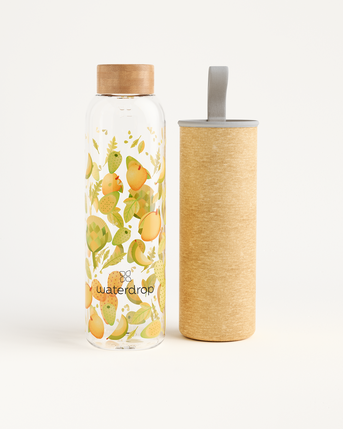 Close-up of Edition Glass bottle with fruit design highlighting its durable borosilicate glass construction for eco-friendly hydration. Available in 600ml and 1L sizes.