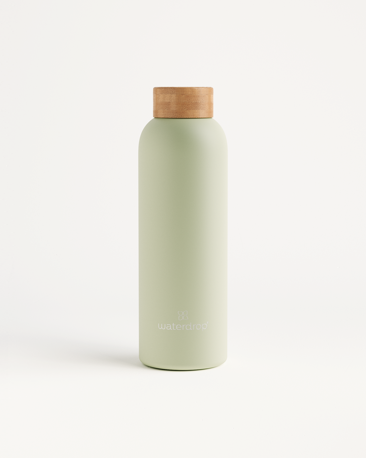 Thermo Steel bottle with cork top, featuring double-walled stainless steel design, keeps drinks cold for 24 hours or hot for 12 hours.