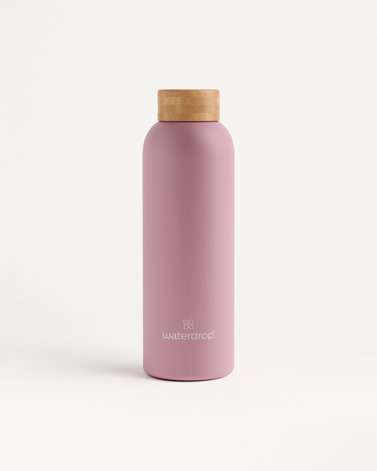 Thermo Steel bottle with a wooden cap, featuring a pink design, perfect for keeping drinks cold or hot. Available in various sizes.