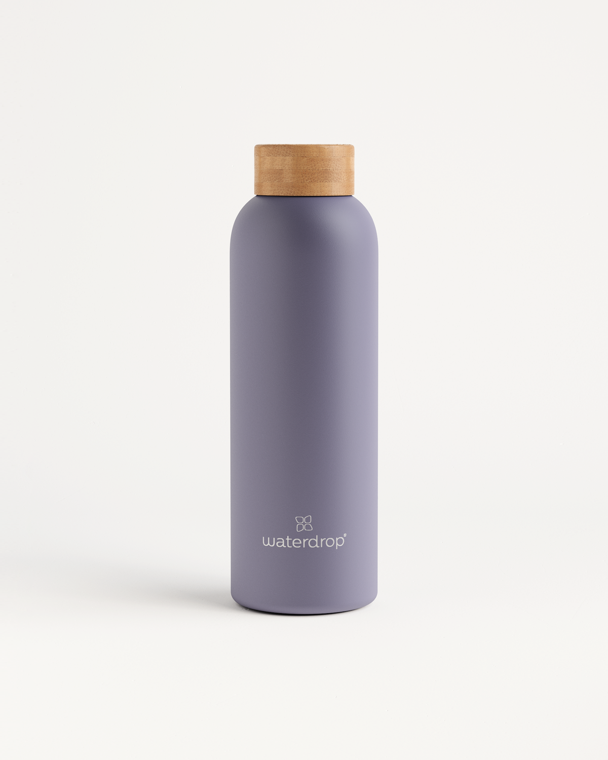 Thermo Steel bottle with a wooden cap, featuring double-walled stainless steel design for temperature retention, available in 400ml, 600ml, or 1L sizes.