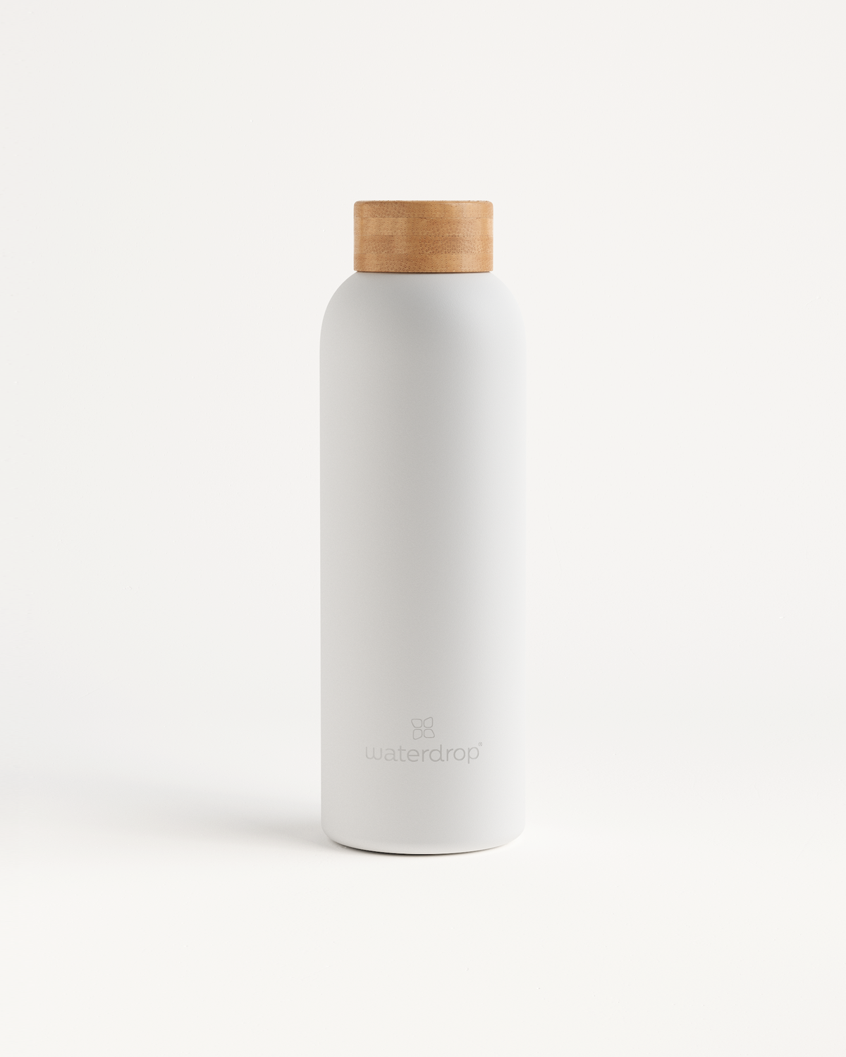 Thermo Steel bottle with brown cap, cylindrical shape, double-walled stainless steel, available in 400ml, 600ml, or 1L, keeps drinks cold or hot.