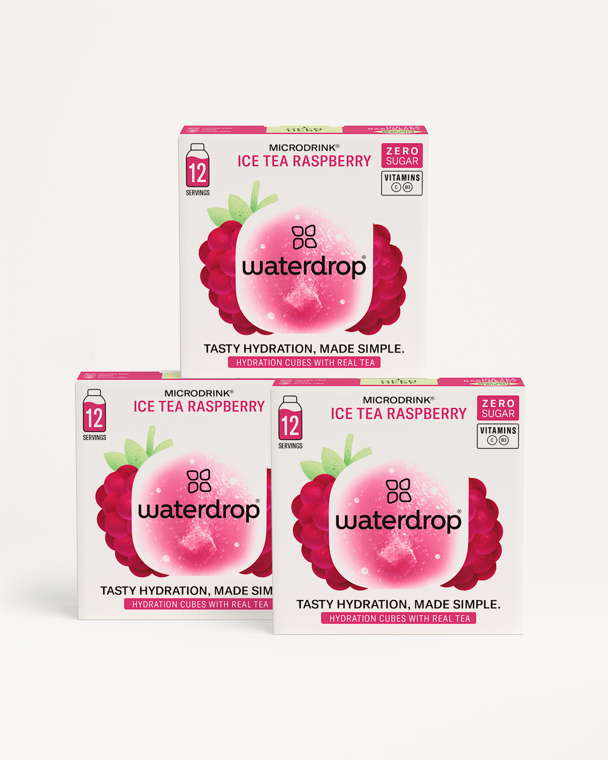ICE TEA Set 2+1: Three boxes of Waterdrop “Microdrink” Raspberry, offering 12 servings each, zero sugar, with vitamins C and B3, for simple hydration.