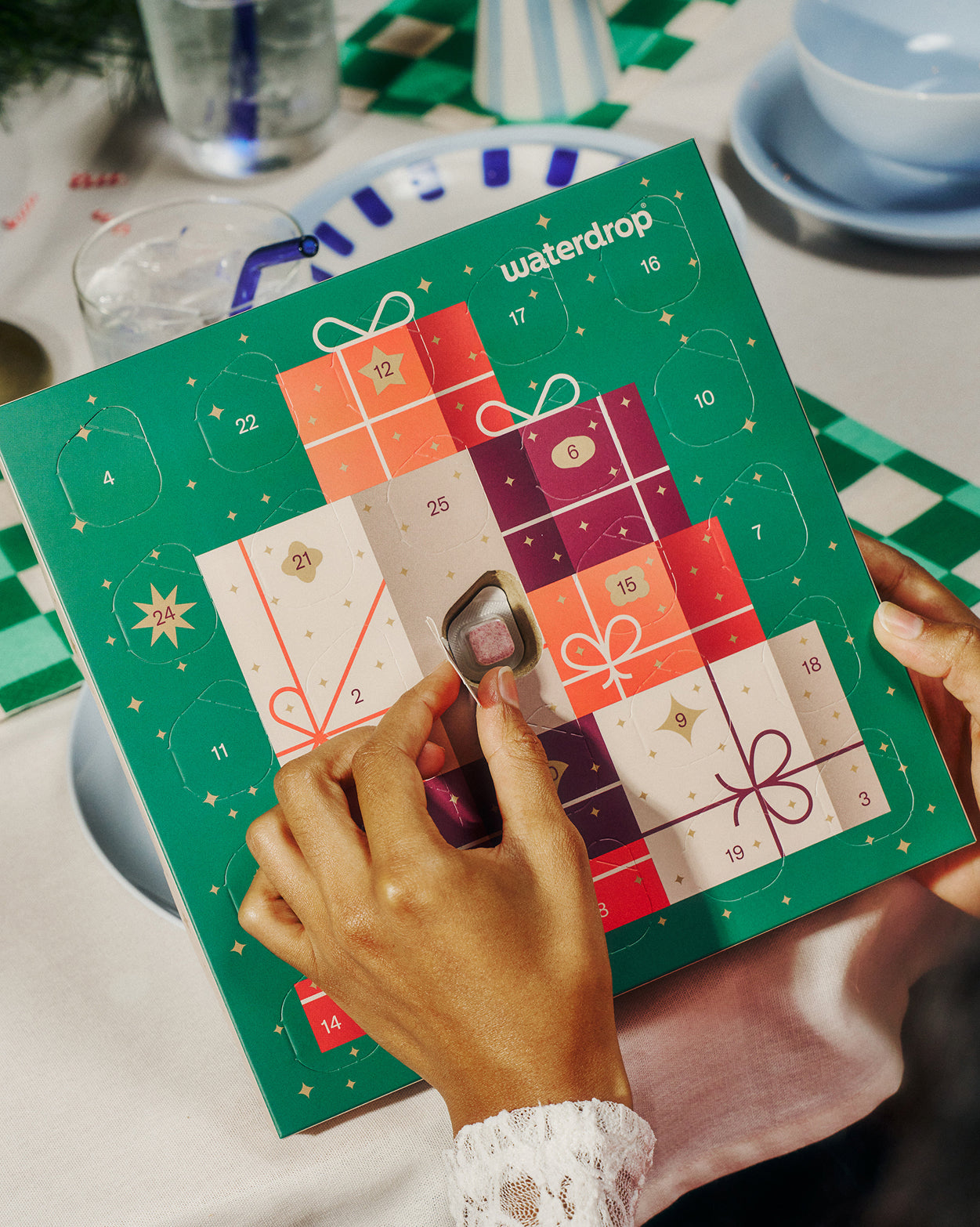 Advent Calendar Small revealing a flavored waterdrop cube.