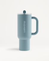 Explorer Thermo Tumbler, a sleek cylinder drinkware with a flip-open straw, ideal for keeping drinks cold for up to 12 hours.