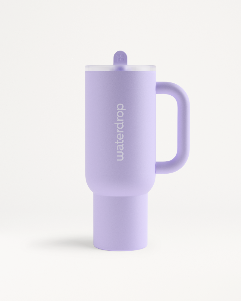 Fusion Explorer Thermo Tumbler close-up, featuring a sleek cylindrical design with a handle, embodying stylish drinkware innovation for hot or cold beverages.