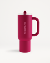 Fusion Explorer Thermo Tumbler in close-up, showcasing its sleek design with a distinctive red lid and cylindrical shape, ideal for stylish sipping.