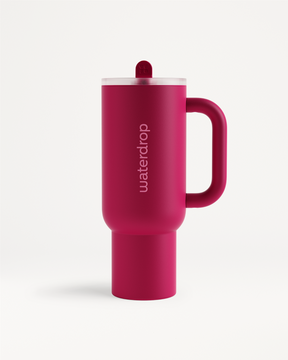 Fusion Explorer Thermo Tumbler in close-up, showcasing its sleek design with a distinctive red lid and cylindrical shape, ideal for stylish sipping.