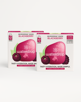 Microdrink 1+1 Twin Pack featuring fruity cubes, highlighted by a promotional red sign, offering a buy one, get one free deal.