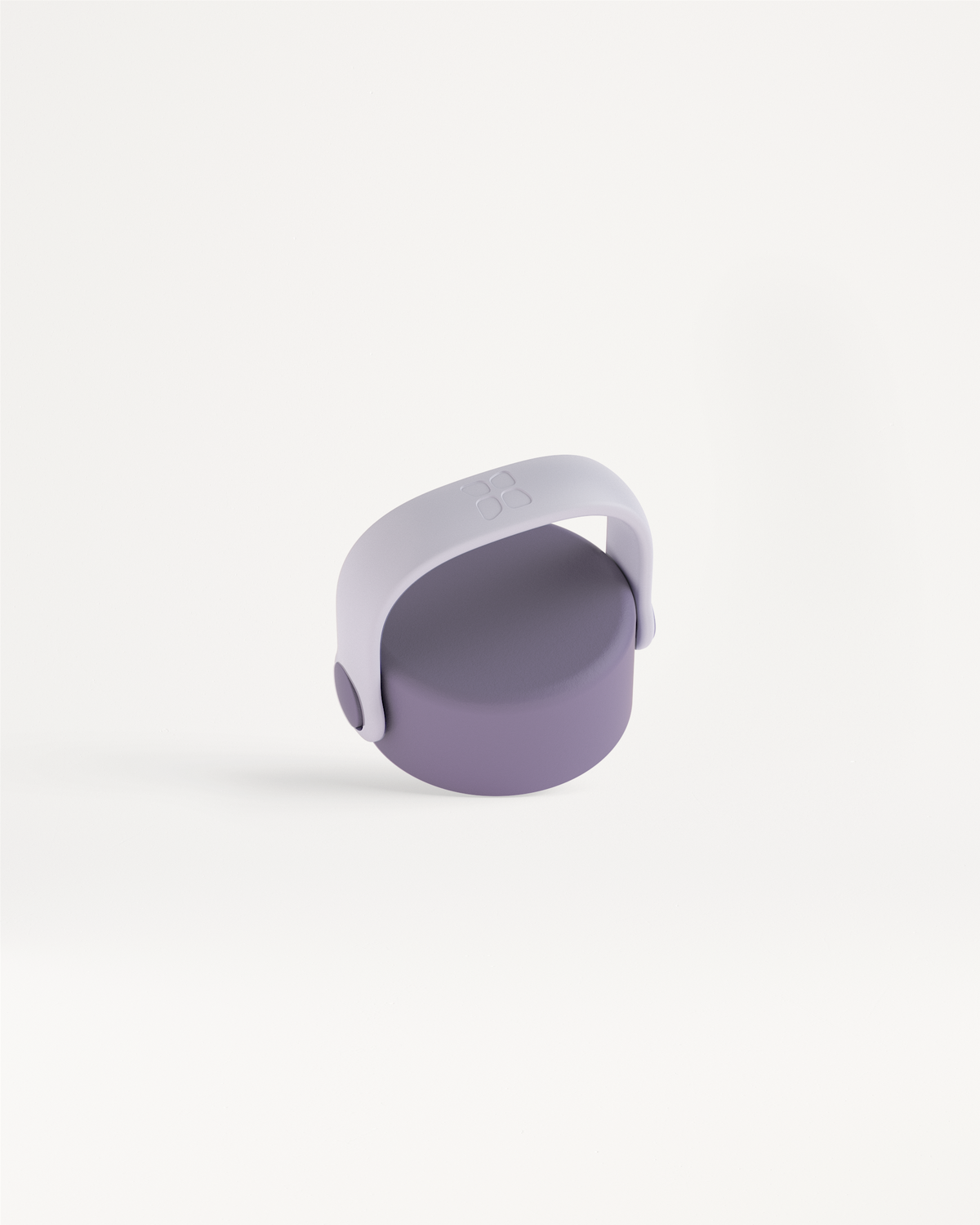Carry Cap: A small, round container with a pivoting U-shaped handle on top, designed for easy transport with an integrated loop for carabiner attachment.