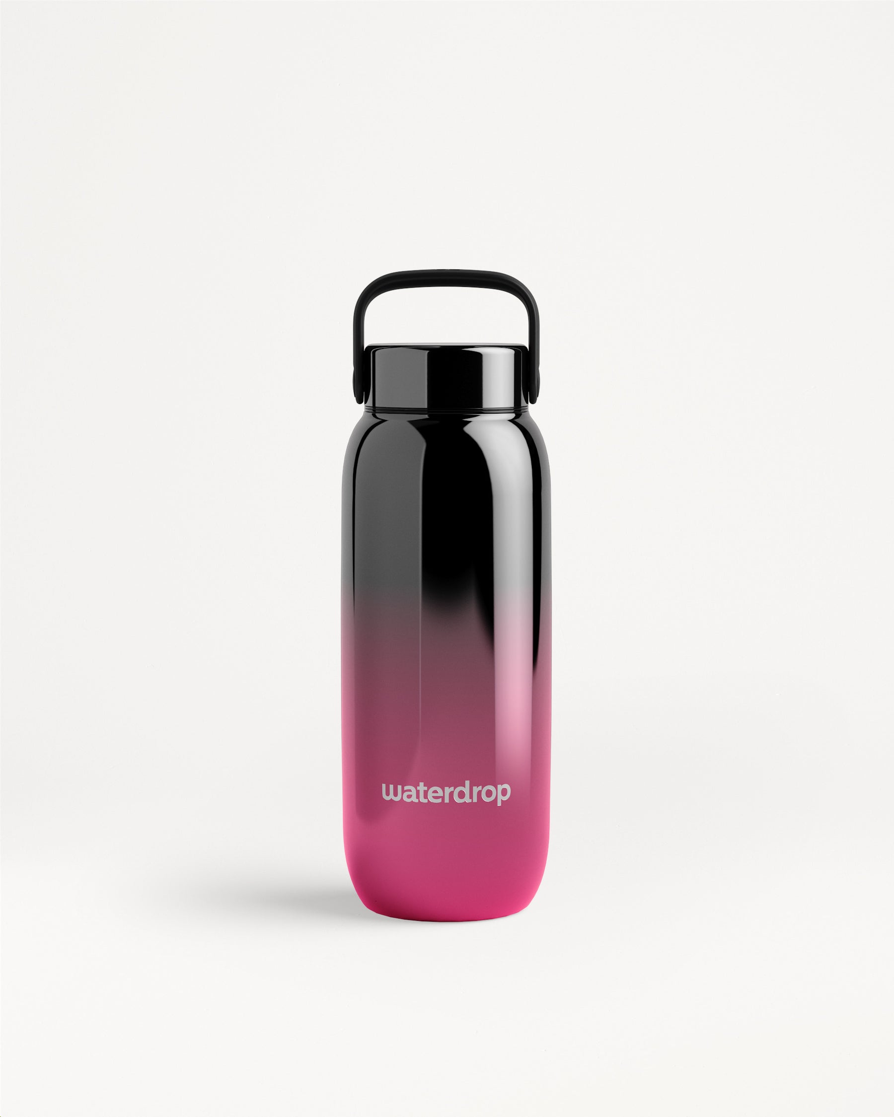 Gradient black-to-pink water bottle with a black cap and carrying handle.