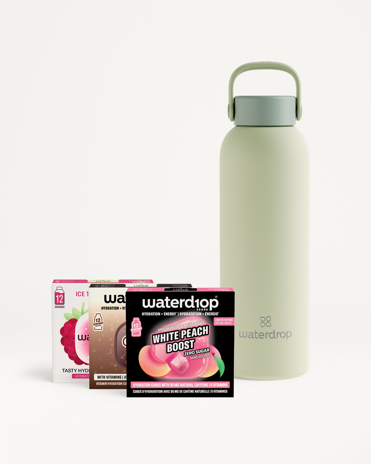 Light green reusable bottle with a gray cap beside several small drink-mix sachets.