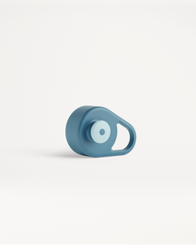 Pull-Up Cap: A teal cylindrical cap with a lighter button and a teardrop handle, designed for easy single-hand use during activities.