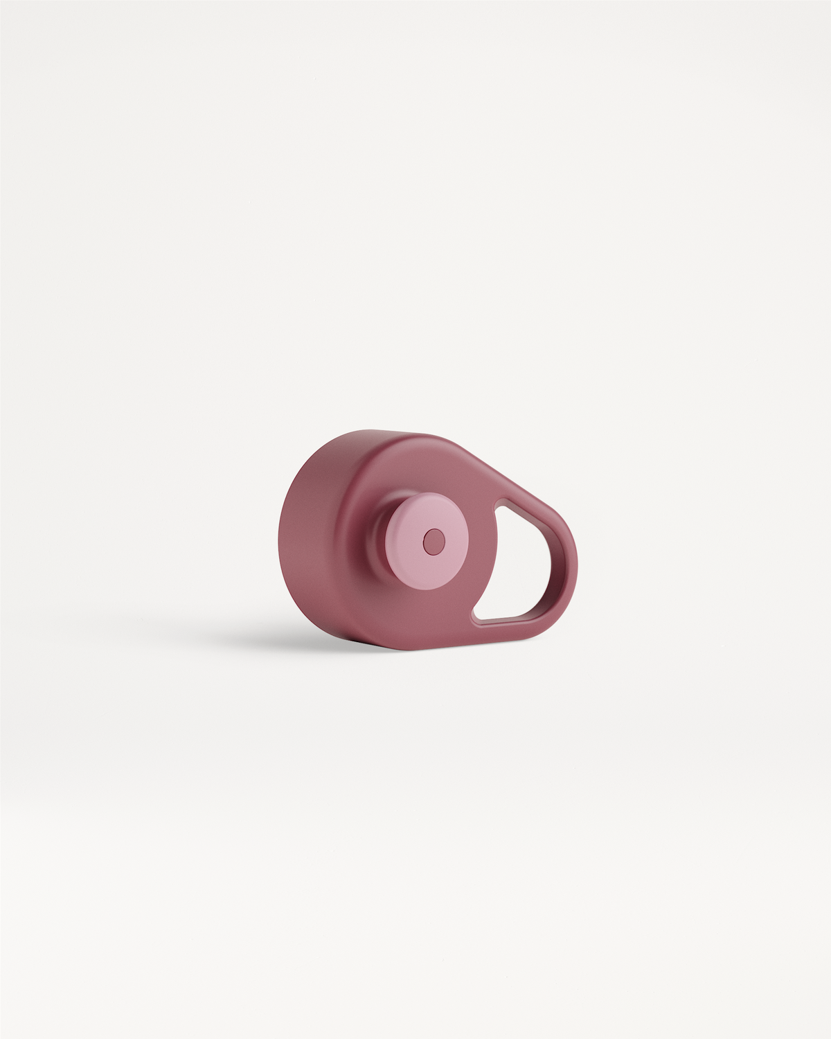 Pull-Up Cap: A compact metal hanger with a circular magnetic face and an integrated hook, designed for convenient attachment and use during activities.