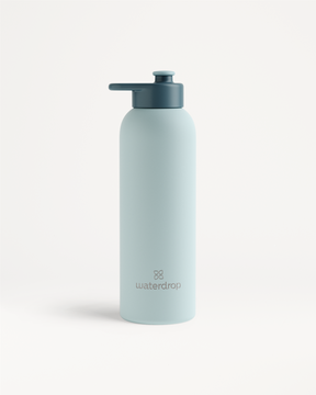 Thermo Steel Bottle · Pull-Up Cap with waterdrop logo, featuring a double-walled design to maintain temperature, with a flip-up spout and handle tab.